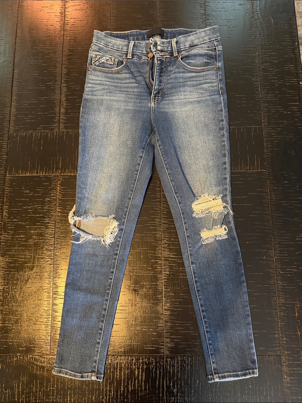 Buckle Distressed Skinny Jeans in Medium Blue